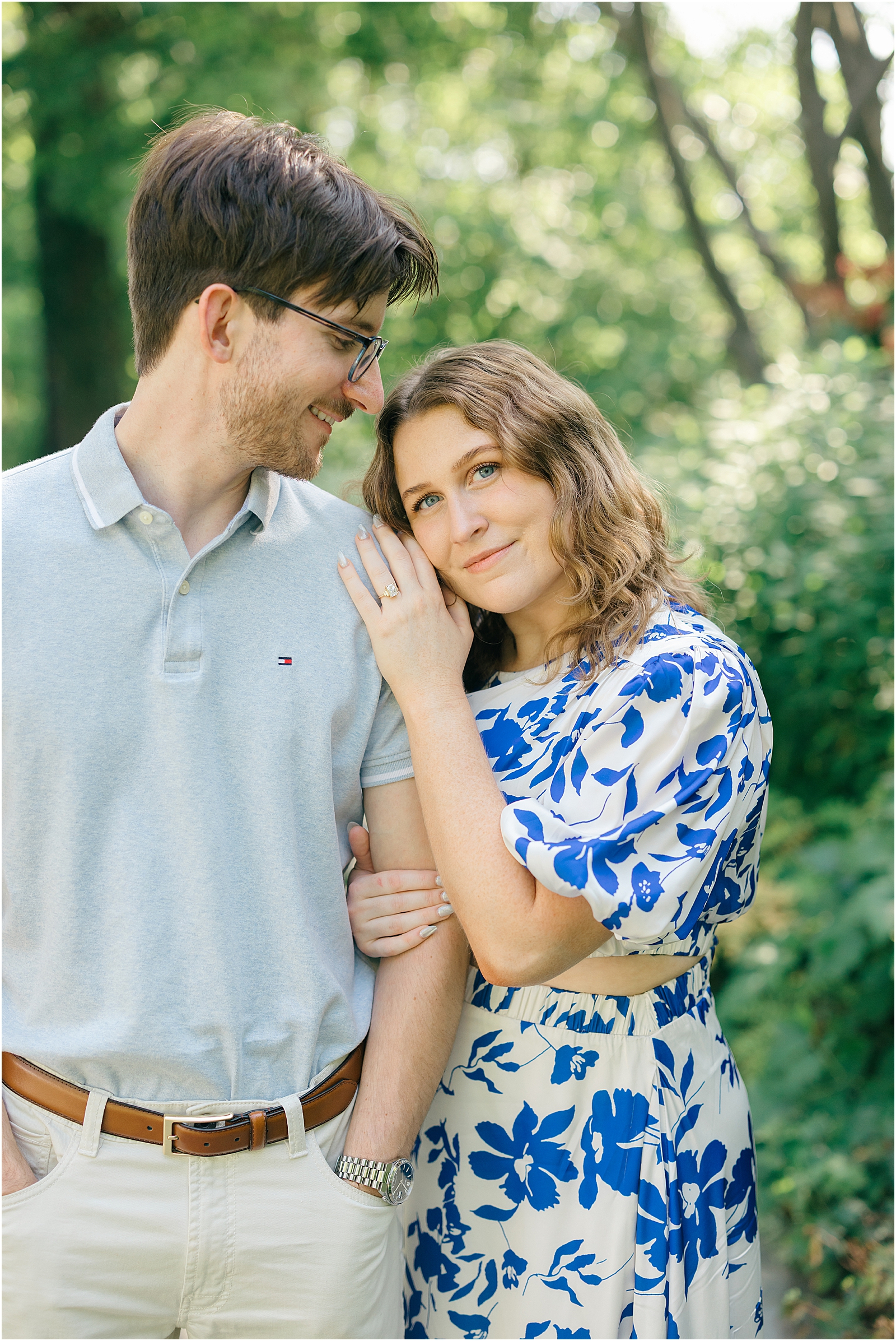 newly engaged couple pose together for engagement photos at Ladew Topiary Gardens in Monkton, MD.